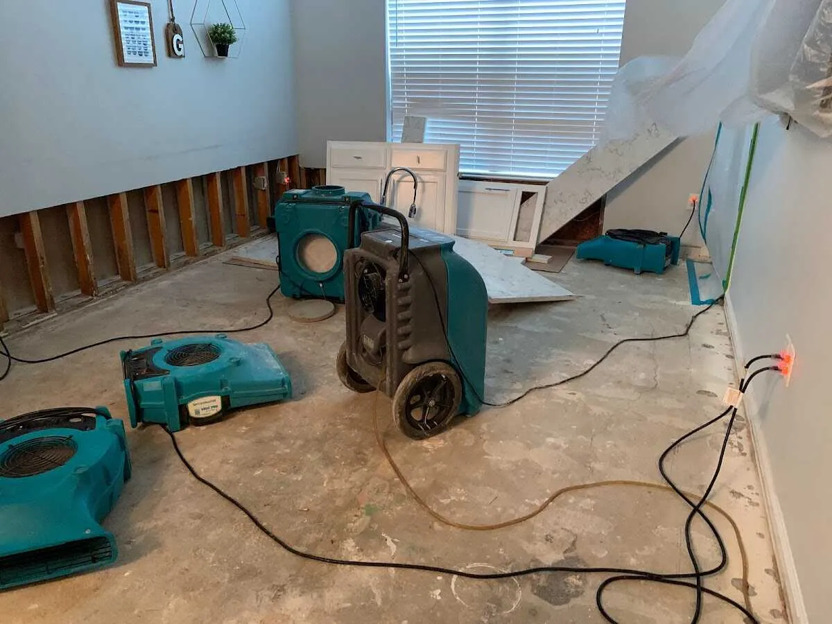 Dehumidifier in flood-cut room for Water Damage Restoration in Runnemede